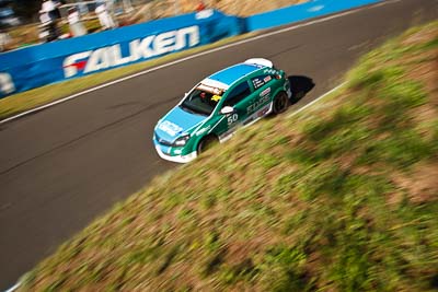 50;25-February-2012;Australia;Bathurst;Bathurst-12-Hour;Chris-Pither;Elliot-Barbour;Holden-HSV-VXR;Mt-Panorama;NSW;New-South-Wales;Racer-Industries;Scott-Pye;auto;endurance;motion-blur;motorsport;racing;wide-angle