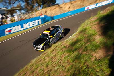 26;25-February-2012;26;Angus-Chapel;Australia;BMW-130i;Bathurst;Bathurst-12-Hour;GWS-Personnel-Motorsport;Mt-Panorama;NSW;New-South-Wales;Richard-Gartner;Tony-Prior;auto;endurance;motion-blur;motorsport;racing;wide-angle