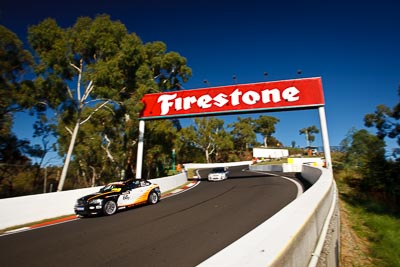 68;25-February-2012;68;Aaron-Harris;Australia;BMW-135i;Bathurst;Bathurst-12-Hour;David-Glasson;Dennis-Roderick;Motorsport-Services;Mt-Panorama;NSW;New-South-Wales;auto;endurance;motorsport;racing;wide-angle