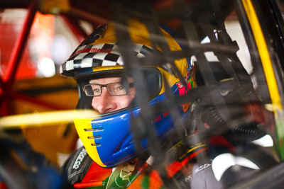 25-February-2012;50mm;Australia;Bathurst;Bathurst-12-Hour;Ivo-Breukers;Mt-Panorama;NSW;New-South-Wales;Red-Camel-Jordans;atmosphere;auto;endurance;in‒car;motorsport;paddock;pitlane;portrait;racing