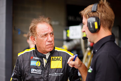 25-February-2012;50mm;Australia;Bathurst;Bathurst-12-Hour;Black-Falcon;Mt-Panorama;NSW;New-South-Wales;Rob-Wilson;atmosphere;auto;endurance;motorsport;paddock;pitlane;portrait;racing