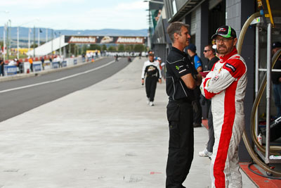 25-February-2012;Australia;Bathurst;Bathurst-12-Hour;John-Bowe;Maranello-Motorsport;Mt-Panorama;NSW;New-South-Wales;atmosphere;auto;endurance;motorsport;paddock;pitlane;portrait;racing;telephoto