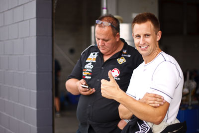 25-February-2012;50mm;Australia;Bathurst;Bathurst-12-Hour;Chris-Pither;Mt-Panorama;NSW;New-South-Wales;atmosphere;auto;endurance;motorsport;paddock;pitlane;portrait;racing