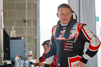 25-February-2012;Australia;Bathurst;Bathurst-12-Hour;Mt-Panorama;NSW;New-South-Wales;Robert-Thomson;atmosphere;auto;endurance;motorsport;paddock;pitlane;portrait;racing;telephoto