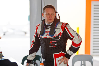 25-February-2012;Australia;Bathurst;Bathurst-12-Hour;Mt-Panorama;NSW;New-South-Wales;Robert-Thomson;atmosphere;auto;endurance;motorsport;paddock;pitlane;portrait;racing;telephoto