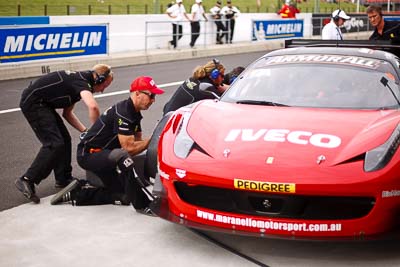 33;25-February-2012;33;50mm;Australia;Bathurst;Bathurst-12-Hour;Ferrari-458-Italia-GT3;Maranello-Motorsport;Mt-Panorama;NSW;New-South-Wales;atmosphere;auto;crew;endurance;mechanics;motorsport;paddock;pitlane;pitstop;portrait;racing;team