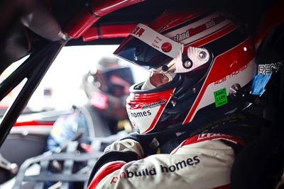 25-February-2012;50mm;Australia;Bathurst;Bathurst-12-Hour;Mt-Panorama;NSW;New-South-Wales;Robert-Thomson;atmosphere;auto;endurance;in‒car;motorsport;paddock;pitlane;portrait;racing