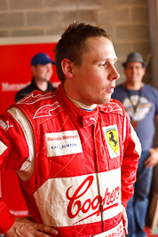 25-February-2012;50mm;Allan-Simonsen;Australia;Bathurst;Bathurst-12-Hour;Maranello-Motorsport;Mt-Panorama;NSW;New-South-Wales;atmosphere;auto;endurance;motorsport;paddock;pitlane;portrait;racing