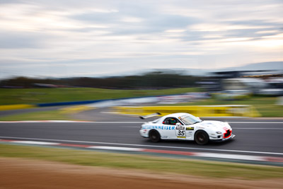 35;26-February-2012;35;Andrew-Bollom;Australia;Bathurst;Bathurst-12-Hour;Duvashen-Padayachee;James-Parish;Mazda-RX‒7;Mazda-RX7;Mt-Panorama;NSW;New-South-Wales;Phil-Alexander;auto;endurance;motion-blur;motorsport;racing;wide-angle