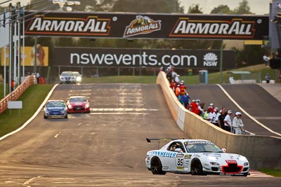 35;26-February-2012;35;Andrew-Bollom;Australia;Bathurst;Bathurst-12-Hour;Duvashen-Padayachee;James-Parish;Mazda-RX‒7;Mazda-RX7;Mt-Panorama;NSW;New-South-Wales;Phil-Alexander;auto;endurance;motorsport;racing;super-telephoto