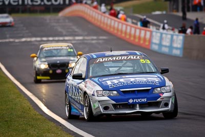 53;26-February-2012;Australia;Bathurst;Bathurst-12-Hour;Dean-Lillie;Holden-HSV-GTS;James-Atkinson;Mt-Panorama;NSW;New-South-Wales;Rick-Newman;auto;endurance;motorsport;racing;super-telephoto