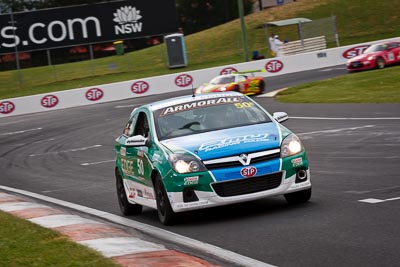 50;26-February-2012;Australia;Bathurst;Bathurst-12-Hour;Chris-Pither;Elliot-Barbour;Holden-HSV-VXR;Mt-Panorama;NSW;New-South-Wales;Racer-Industries;Scott-Pye;auto;endurance;motorsport;racing;telephoto