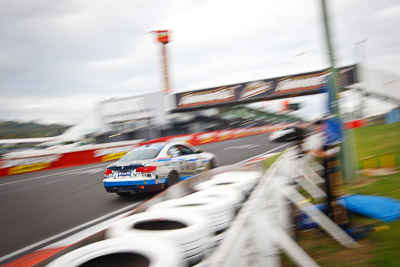 28;26-February-2012;Australia;BMW-335i;Bathurst;Bathurst-12-Hour;Christian-DAgostin;GWS-Personnel-Motorsport;Garth-Duffy;Mt-Panorama;NSW;New-South-Wales;Peter-ODonnell;auto;endurance;motion-blur;motorsport;racing;wide-angle