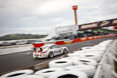 65;26-February-2012;65;Australia;Bathurst;Bathurst-12-Hour;Brett-Niall;Motorsport-Services;Mt-Panorama;NSW;New-South-Wales;Porsche-911-GT3-Cup-997;Scott-ODonnell;Simon-McLennon;auto;endurance;motion-blur;motorsport;racing;wide-angle