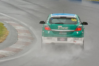 50;26-February-2012;Australia;Bathurst;Bathurst-12-Hour;Chris-Pither;Elliot-Barbour;Holden-HSV-VXR;Mt-Panorama;NSW;New-South-Wales;Racer-Industries;Scott-Pye;auto;endurance;motorsport;racing;rain;super-telephoto;wet