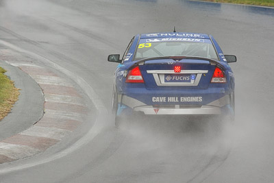 53;26-February-2012;Australia;Bathurst;Bathurst-12-Hour;Dean-Lillie;Holden-HSV-GTS;James-Atkinson;Mt-Panorama;NSW;New-South-Wales;Rick-Newman;auto;endurance;motorsport;racing;rain;super-telephoto;wet