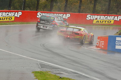 27;33;26-February-2012;27;33;Allan-Shephard;Australia;BMW-130i;Bathurst;Bathurst-12-Hour;Carl-Oberhauser;Clearwater-Racing;Craig-Baird;Ferrari-458-Italia-GT3;GWS-Personnel-Motorsport;Kean-Booker;Matt-Griffin;Mok-Weng-Sun;Mt-Panorama;NSW;New-South-Wales;auto;endurance;motorsport;racing;rain;super-telephoto;wet