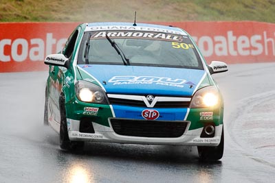 50;26-February-2012;Australia;Bathurst;Bathurst-12-Hour;Chris-Pither;Elliot-Barbour;Holden-HSV-VXR;Mt-Panorama;NSW;New-South-Wales;Racer-Industries;Scott-Pye;auto;endurance;motorsport;racing;rain;super-telephoto;wet