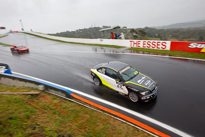 67;26-February-2012;67;Antony-Head;Australia;BMW-135i;Bathurst;Bathurst-12-Hour;John-De-Veth;Lewis-Scott;Motorsport-Services;Mt-Panorama;NSW;New-South-Wales;Todd-Murphy;auto;endurance;motorsport;racing;rain;wet;wide-angle
