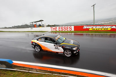 68;26-February-2012;68;Aaron-Harris;Australia;BMW-135i;Bathurst;Bathurst-12-Hour;David-Glasson;Dennis-Roderick;Motorsport-Services;Mt-Panorama;NSW;New-South-Wales;auto;endurance;motorsport;racing;rain;wet;wide-angle