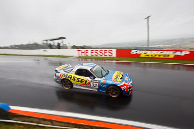 32;26-February-2012;Australia;Bathurst;Bathurst-12-Hour;Gerry-Murphy;Jim-Pollicina;Mazda-RX‒7;Mazda-RX7;Michael-Caine;Mt-Panorama;NSW;New-South-Wales;auto;endurance;motorsport;racing;rain;wet;wide-angle