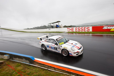 65;26-February-2012;65;Australia;Bathurst;Bathurst-12-Hour;Brett-Niall;Motorsport-Services;Mt-Panorama;NSW;New-South-Wales;Porsche-911-GT3-Cup-997;Scott-ODonnell;Simon-McLennon;auto;endurance;motorsport;racing;rain;wet;wide-angle