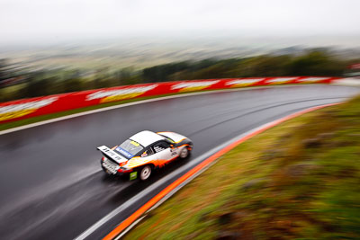 66;26-February-2012;Allan-Dippie;Australia;Bathurst;Bathurst-12-Hour;Bruce-Thomlinson;Mark-Maddren;Motorsport-Services;Mt-Panorama;NSW;New-South-Wales;Porsche-911-GT3-Cup-996;auto;endurance;motion-blur;motorsport;racing;rain;wet;wide-angle