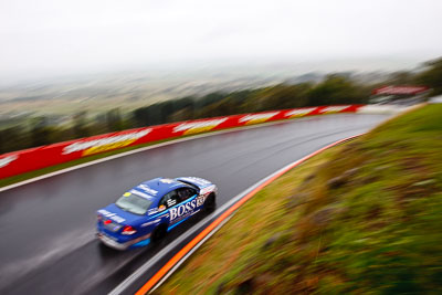 53;26-February-2012;Australia;Bathurst;Bathurst-12-Hour;Dean-Lillie;Holden-HSV-GTS;James-Atkinson;Mt-Panorama;NSW;New-South-Wales;Rick-Newman;auto;endurance;motion-blur;motorsport;racing;rain;wet;wide-angle