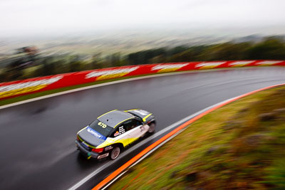 67;26-February-2012;67;Antony-Head;Australia;BMW-135i;Bathurst;Bathurst-12-Hour;John-De-Veth;Lewis-Scott;Motorsport-Services;Mt-Panorama;NSW;New-South-Wales;Todd-Murphy;auto;endurance;motion-blur;motorsport;racing;rain;wet;wide-angle