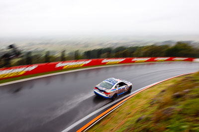 28;26-February-2012;Australia;BMW-335i;Bathurst;Bathurst-12-Hour;Christian-DAgostin;GWS-Personnel-Motorsport;Garth-Duffy;Mt-Panorama;NSW;New-South-Wales;Peter-ODonnell;auto;endurance;motion-blur;motorsport;racing;rain;wet;wide-angle