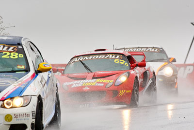 62;26-February-2012;62;Australia;Bathurst;Bathurst-12-Hour;Christian-Klien;Lotus-Exige-S;Mt-Panorama;NSW;New-South-Wales;Robert-Thomson;Sarah-Harley;Topshot;auto;endurance;motorsport;racing;rain;super-telephoto;wet