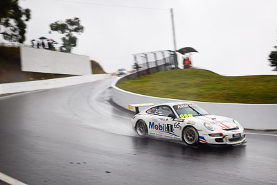 65;26-February-2012;65;Australia;Bathurst;Bathurst-12-Hour;Brett-Niall;Motorsport-Services;Mt-Panorama;NSW;New-South-Wales;Porsche-911-GT3-Cup-997;Scott-ODonnell;Simon-McLennon;auto;endurance;motion-blur;motorsport;racing;rain;wet;wide-angle