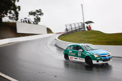 50;26-February-2012;Australia;Bathurst;Bathurst-12-Hour;Chris-Pither;Elliot-Barbour;Holden-HSV-VXR;Mt-Panorama;NSW;New-South-Wales;Racer-Industries;Scott-Pye;auto;endurance;motion-blur;motorsport;racing;rain;wet;wide-angle
