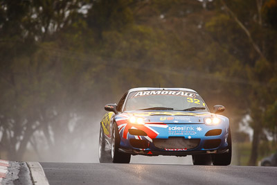 32;26-February-2012;Australia;Bathurst;Bathurst-12-Hour;Gerry-Murphy;Jim-Pollicina;Mazda-RX‒7;Mazda-RX7;Michael-Caine;Mt-Panorama;NSW;New-South-Wales;auto;endurance;motorsport;racing;rain;super-telephoto;wet