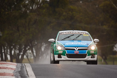 50;26-February-2012;Australia;Bathurst;Bathurst-12-Hour;Chris-Pither;Elliot-Barbour;Holden-HSV-VXR;Mt-Panorama;NSW;New-South-Wales;Racer-Industries;Scott-Pye;auto;endurance;motorsport;racing;rain;super-telephoto;wet