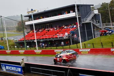 62;26-February-2012;62;Australia;Bathurst;Bathurst-12-Hour;Christian-Klien;Lotus-Exige-S;Mt-Panorama;NSW;New-South-Wales;Robert-Thomson;Sarah-Harley;auto;endurance;motorsport;racing;rain;telephoto;wet