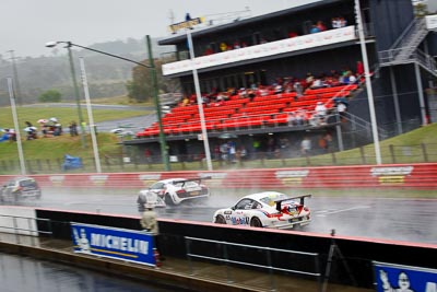 65;26-February-2012;65;Australia;Bathurst;Bathurst-12-Hour;Brett-Niall;Motorsport-Services;Mt-Panorama;NSW;New-South-Wales;Porsche-911-GT3-Cup-997;Scott-ODonnell;Simon-McLennon;auto;endurance;motorsport;racing;rain;telephoto;wet