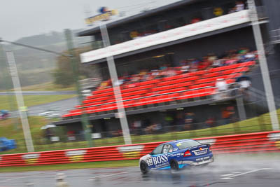 53;26-February-2012;Australia;Bathurst;Bathurst-12-Hour;Dean-Lillie;Holden-HSV-GTS;James-Atkinson;Mt-Panorama;NSW;New-South-Wales;Rick-Newman;auto;endurance;motion-blur;motorsport;racing;rain;telephoto;wet