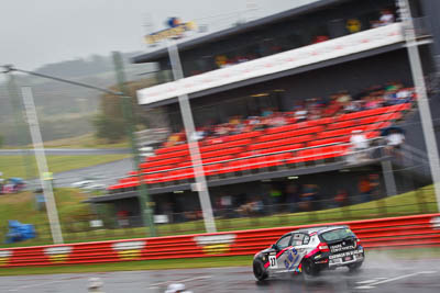 27;26-February-2012;27;Allan-Shephard;Australia;BMW-130i;Bathurst;Bathurst-12-Hour;Carl-Oberhauser;GWS-Personnel-Motorsport;Kean-Booker;Mt-Panorama;NSW;New-South-Wales;auto;endurance;motion-blur;motorsport;racing;rain;telephoto;wet