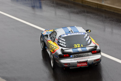 32;26-February-2012;Australia;Bathurst;Bathurst-12-Hour;Gerry-Murphy;Jim-Pollicina;Mazda-RX‒7;Mazda-RX7;Michael-Caine;Mt-Panorama;NSW;New-South-Wales;auto;endurance;motion-blur;motorsport;racing;rain;telephoto;wet