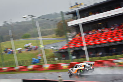 66;26-February-2012;Allan-Dippie;Australia;Bathurst;Bathurst-12-Hour;Bruce-Thomlinson;Mark-Maddren;Motorsport-Services;Mt-Panorama;NSW;New-South-Wales;Porsche-911-GT3-Cup-996;auto;endurance;motion-blur;motorsport;racing;rain;telephoto;wet