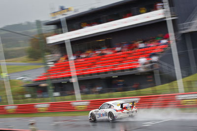 65;26-February-2012;65;Australia;Bathurst;Bathurst-12-Hour;Brett-Niall;Motorsport-Services;Mt-Panorama;NSW;New-South-Wales;Porsche-911-GT3-Cup-997;Scott-ODonnell;Simon-McLennon;auto;endurance;motion-blur;motorsport;racing;rain;telephoto;wet