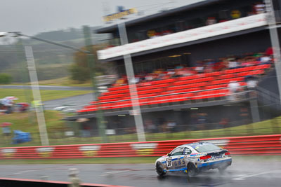 28;26-February-2012;Australia;BMW-335i;Bathurst;Bathurst-12-Hour;Christian-DAgostin;GWS-Personnel-Motorsport;Garth-Duffy;Mt-Panorama;NSW;New-South-Wales;Peter-ODonnell;auto;endurance;motion-blur;motorsport;racing;rain;telephoto;wet