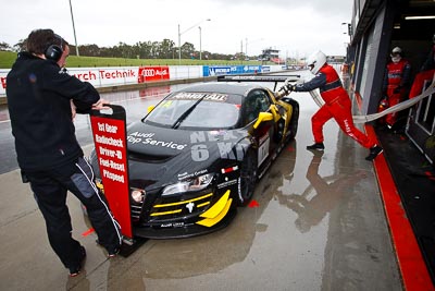 1;1;26-February-2012;Audi-R8-LMS;Australia;Bathurst;Bathurst-12-Hour;Christer-Jöns;Christopher-Mies;Darryl-OYoung;Mt-Panorama;NSW;New-South-Wales;Phoenix-Racing;auto;endurance;motorsport;pit-crew;pitlane;pitstop;racing;rain;wet;wide-angle