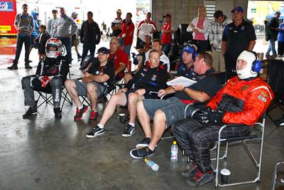 26-February-2012;Australia;Bathurst;Bathurst-12-Hour;Hunter-Sports-Group;Mt-Panorama;NSW;New-South-Wales;Steven-Richards;Tinkler-Motorsports;atmosphere;auto;crew;endurance;mechanics;motorsport;paddock;pitlane;portrait;racing;team;wide-angle