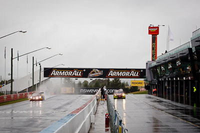 1;14;1;14;26-February-2012;Audi-R8-LMS;Australia;Bathurst;Bathurst-12-Hour;Christer-Jöns;Christopher-Mies;Darryl-OYoung;Henk-Thijssen;Ivo-Breukers;Martin-Bailey;Mt-Panorama;NSW;New-South-Wales;Phoenix-Racing;Red-Camel-Jordans;Seat-Leon-20-TDI;auto;endurance;motorsport;racing;rain;telephoto;wet