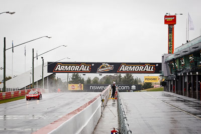 62;26-February-2012;62;Australia;Bathurst;Bathurst-12-Hour;Christian-Klien;Lotus-Exige-S;Mt-Panorama;NSW;New-South-Wales;Robert-Thomson;Sarah-Harley;auto;endurance;motorsport;racing;rain;telephoto;wet