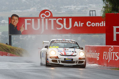 65;26-February-2012;65;Australia;Bathurst;Bathurst-12-Hour;Brett-Niall;Motorsport-Services;Mt-Panorama;NSW;New-South-Wales;Porsche-911-GT3-Cup-997;Scott-ODonnell;Simon-McLennon;auto;endurance;motorsport;racing;rain;telephoto;wet