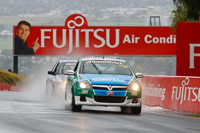 50;26-February-2012;Australia;Bathurst;Bathurst-12-Hour;Chris-Pither;Elliot-Barbour;Holden-HSV-VXR;Mt-Panorama;NSW;New-South-Wales;Racer-Industries;Scott-Pye;auto;endurance;motorsport;racing;rain;telephoto;wet