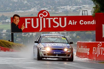 53;26-February-2012;Australia;Bathurst;Bathurst-12-Hour;Dean-Lillie;Holden-HSV-GTS;James-Atkinson;Mt-Panorama;NSW;New-South-Wales;Rick-Newman;auto;endurance;motorsport;racing;rain;telephoto;wet